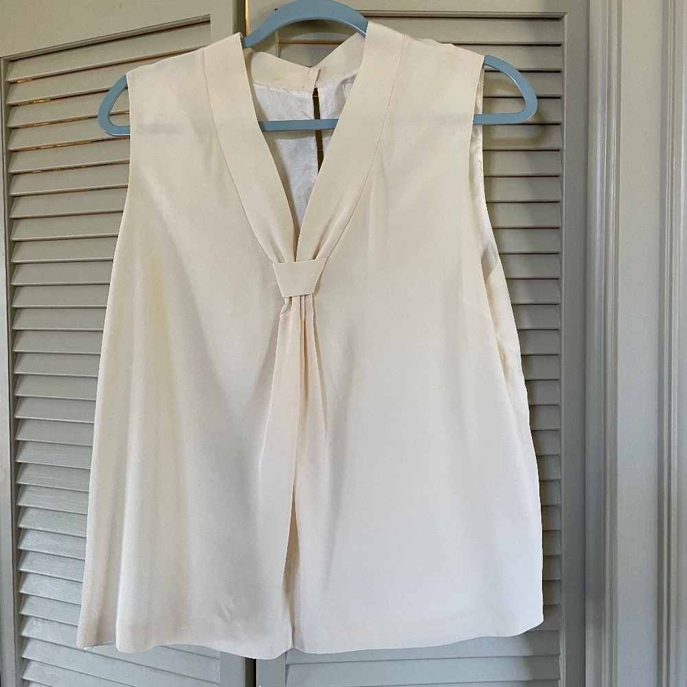 Classic Kate Spade 100% silk, lining 100% polyester ivory blouse size.